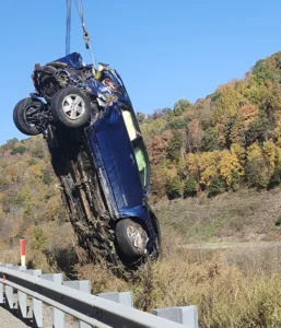 Woman injured after SUV plunges over 100 feet down embankment